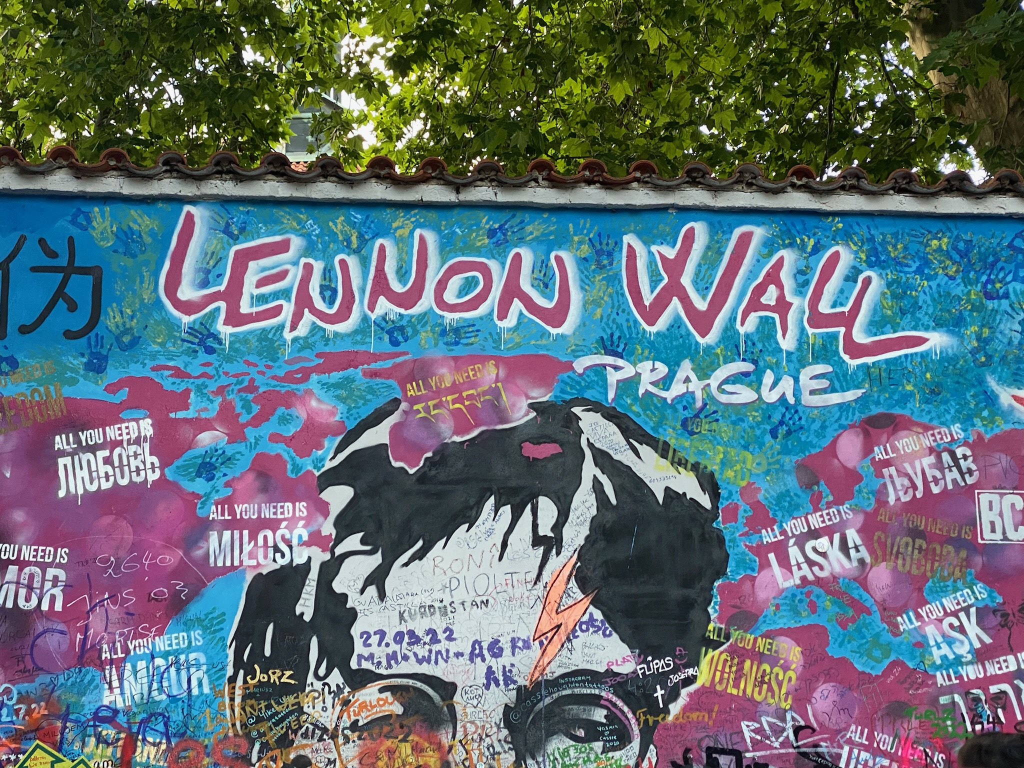 John Lennon Memorial wall in Prague
