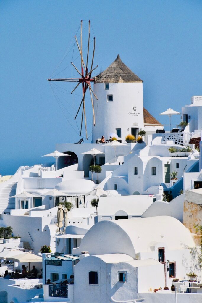 Windmill in Santorini, Greece. Vacation ideas for Santorini.